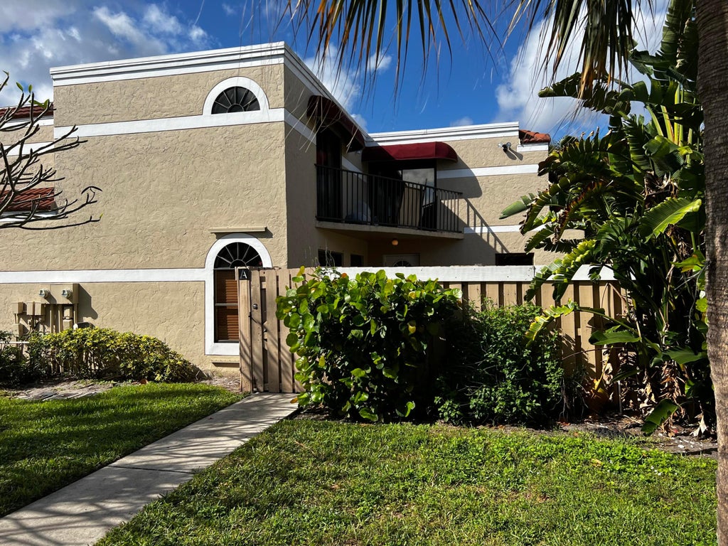 Photo of 3670 Village Drive #A, Delray Beach, FL 33445 (MLS # R11056593)