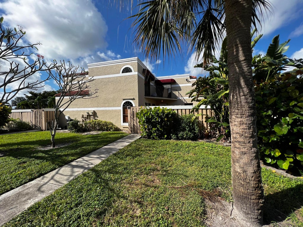 Photo of 3670 Village Drive #A, Delray Beach, FL 33445 (MLS # R11056593)
