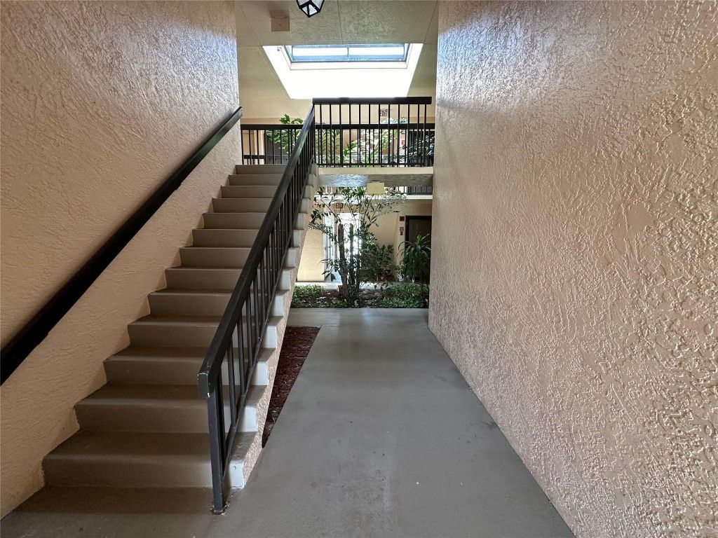 Photo of 2069 NE Collins Circle #10, Jensen Beach, FL 34957 (MLS # F10449680)