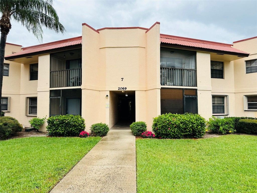 Photo of 2069 NE Collins Circle #10, Jensen Beach, FL 34957 (MLS # F10449680)