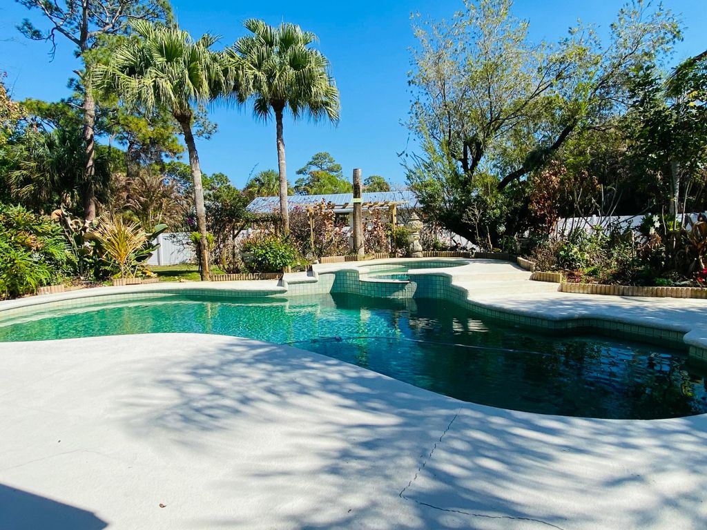 Photo of 437 NE Bayberry Lane, Jensen Beach, FL 34957 (MLS # R11151055)