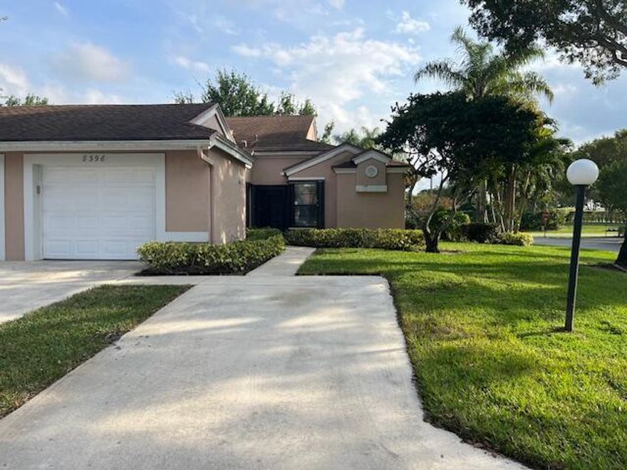 55+ Adult Gated Community.  Beautiful  Large 3/2  corner villa with 1 car garage with 2 additional spaces in the desirable location of Park Shore in Whisper Walk. Kitchen has stainless steel appliances with granite countertops , soft closing drawers. There is also a snack bar and room for a table.   Ceramic tile throughout. Plantation Shutters.  Washer & Dryer in unit. Owner's Suite has custom closest.  Frameless shower door, double sinks.  1 Sky Light in Kitchen and 1 in Living Room. Community has Clubhouse, pool, Tennis, Pickle ball, and racquet ball courts. Home shows like a model.