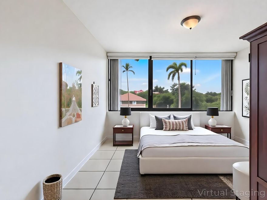 This bright and airy 2-bedroom condo, located on the second floor, offers convenient access and boasts a prime location directly across from a renowned Jack Nicklaus-designed golf course. Motivated seller, priced for a quick sale! Step outside your door to enjoy the convenience of the Palm Beach Outlets, Whole Foods, I-95, or take a short 10-minute drive to Palm Beach Island, 5 minutes to vibrant downtown West Palm Beach, and Palm Beach Airport. A perfect opportunity for full-time living or a seasonal retreat! This prime location offers unmatched comfort, convenience, and lifestyle. The building passed its 50-year milestone inspection at the end of 2024.