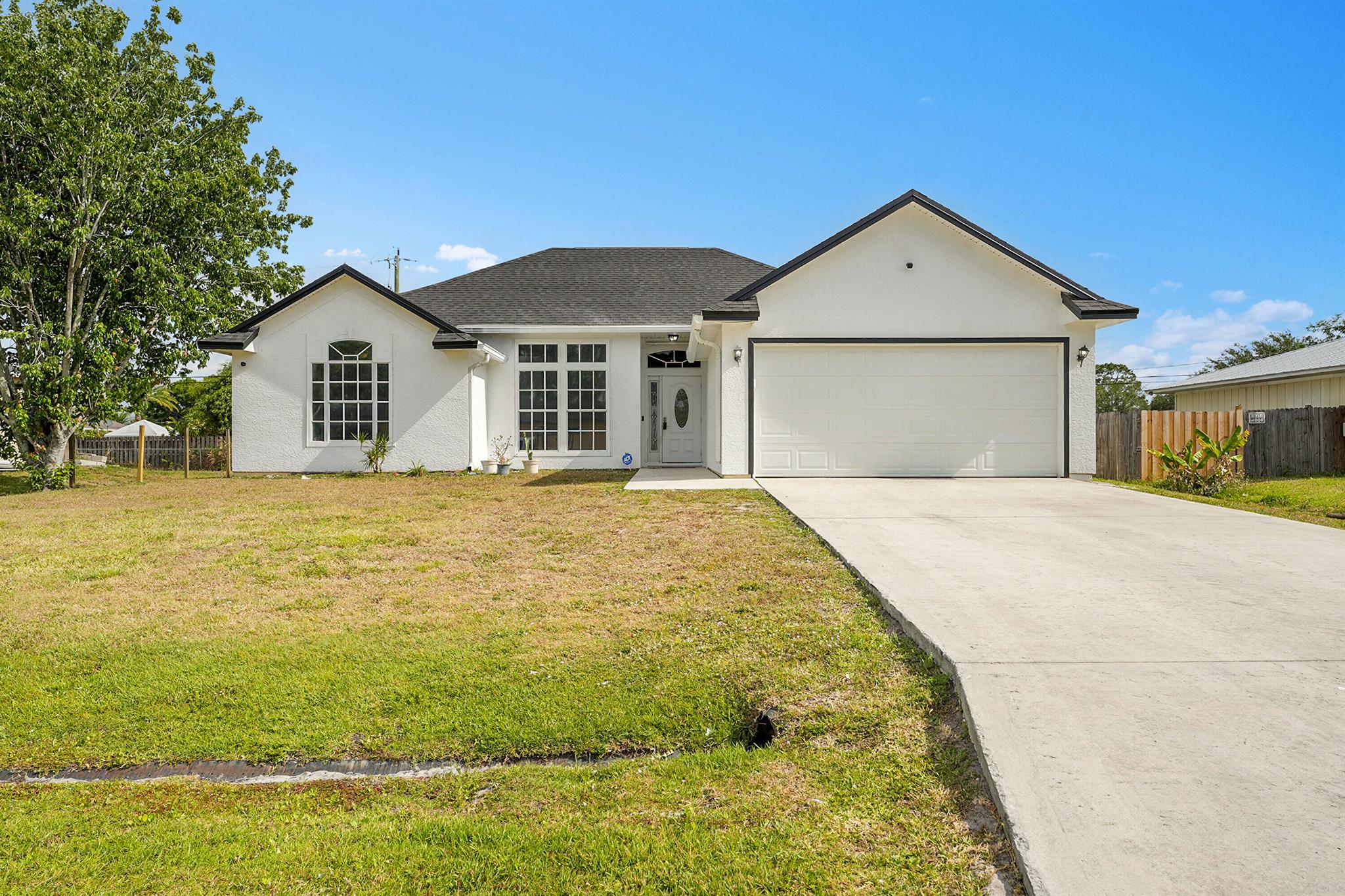 This adorable 3 bedroom, 2 bathroom home is tucked away in a quiet neighborhood. This home features a light and airy open-concept living space with an enclosed patio and a nice size backyard. Offering a freshly painted exterior, newer roof 2023, newer HWH 2021, newer HVAC 2021, a bathroom remodel in 2022, & newer garage door 2022. This home is centrally located close to shopping, dining and the Crosstown Parkway.