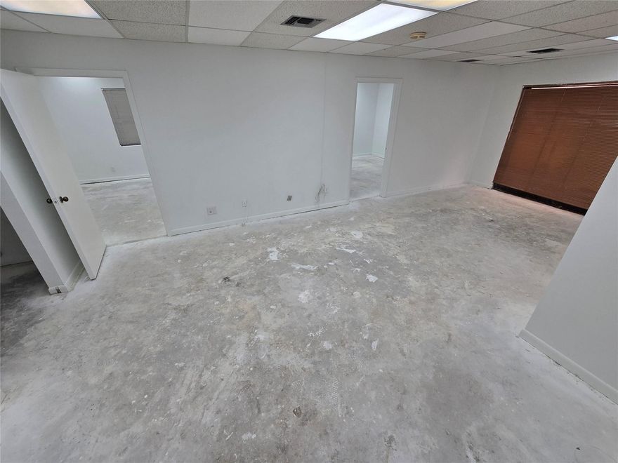 Motivated Seller! Two-story corner unit is located in the tropical Belle Terre complex with plenty of parking! Freshly painted and carpet removed for new owner’s customization. Office/Medical space is 2415+/- SF. Building A is suitable for medical or professional use with frontage to Oakland Park. Unit #101 is a two-story unit (with elevator access) with a reception area, six offices, a conference room, two restrooms, and an open area. Don't miss this opportunity! Full building is also available for sale which includes a first floor unit set up for medical use.
