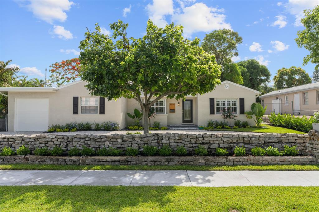 This newly renovated and beautifully landscaped home in the historic Northwood Hills neighborhood is perfect for families. With 4 bedrooms and 2 bathrooms, there is plenty of space for everyone. The terrazzo floors have been restored to their original beauty and add a touch of elegance to the home. The massive family/media room is perfect for movie nights or entertaining guests. With over 2,300 square feet of living space, there is plenty of room to spread out and make this house your own. The backyard is fully fenced and features a privacy hedge, making it the perfect place to relax and enjoy the Florida sunshine. Additionally, there is a bonus cottage that can be used as a home office, yoga studio, or zen den. Located close to Downtown West Palm, Palm Beach Outlets, and (Continue)