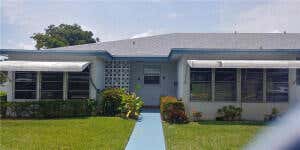 Photo of 1180 S DRIVE Circle #A, Delray Beach, FL 33445 (MLS # B26052388)