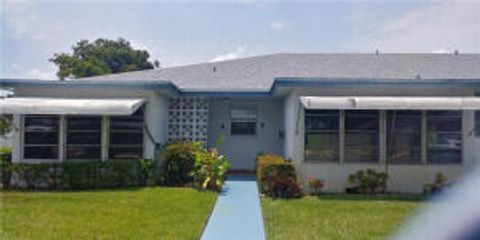 Photo of 1180 S DRIVE Circle #A, Delray Beach, FL 33445 (MLS # B26052388)