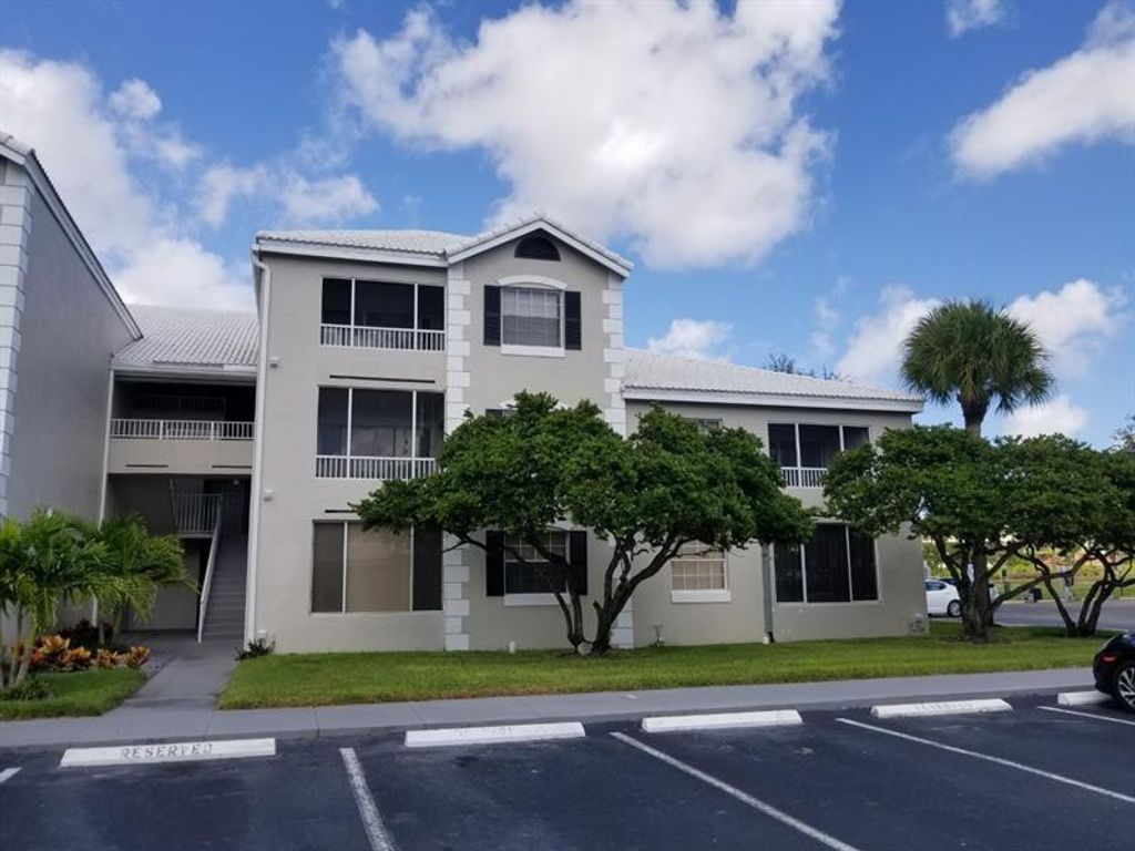 Photo of 2861 N Oakland Forest Drive #307, Oakland Park, FL 33309 (MLS # B26000515)
