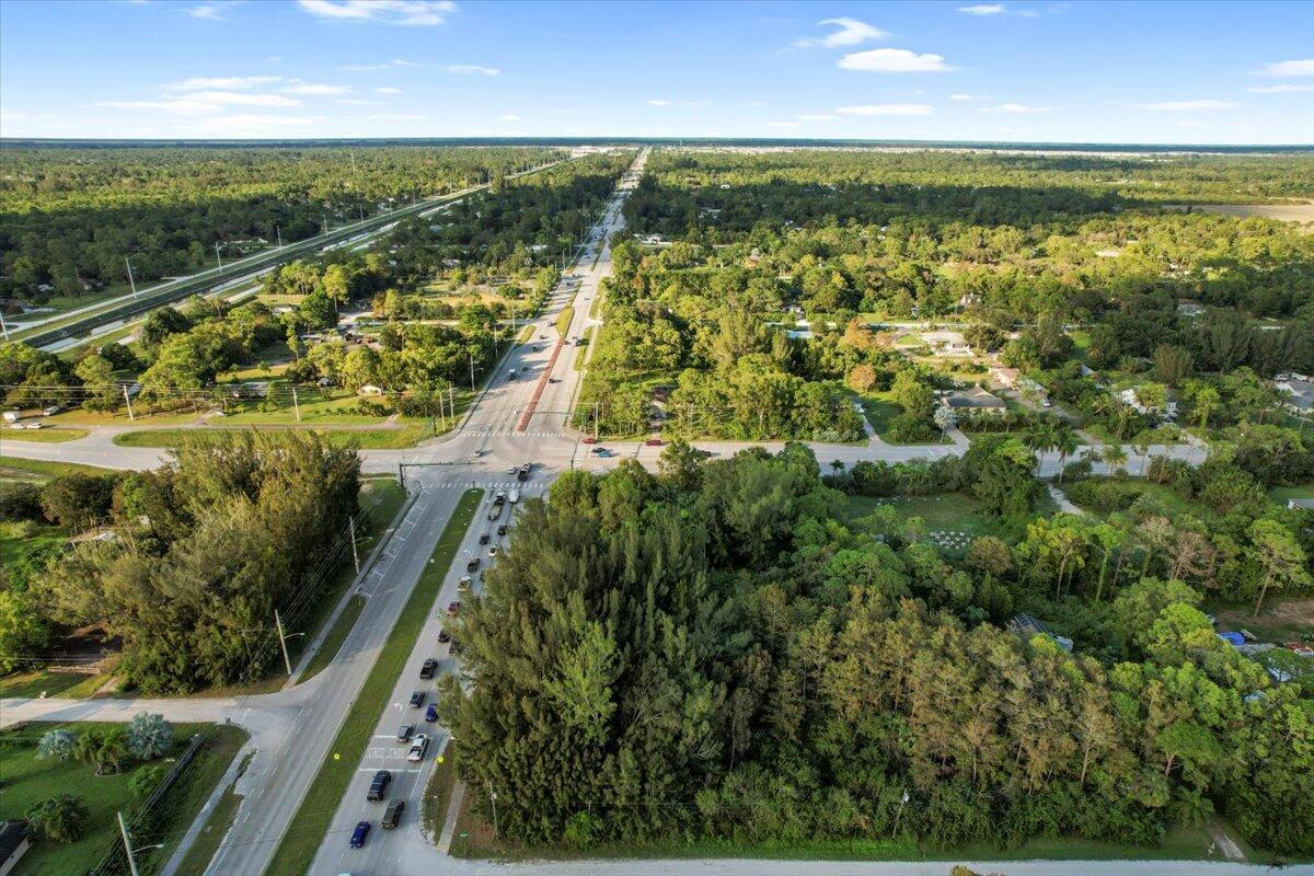 Presenting a unique investment opportunity: two adjoining parcels in Palm Beach County, each with its own parcel control number and individual listing. The seller prefers to sell both properties together, offering over 2 acres of prime land in a highly desirable area experiencing rapid growth and redevelopment.Parcel 1: A .98-acre corner lot located at Okeechobee Blvd and Seminole Pratt Whitney Road, offering high visibility and accessibility.Parcel 2: A 1.12-acre lot with additional frontage along Seminole Pratt Whitney Road, enhancing its development potential.Currently zoned Agricultural Residential, these parcels present immense potential for visionary development in a thriving location.
