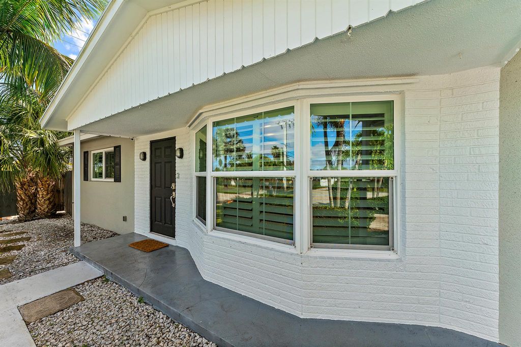 Photo of 3712 Lighthouse Drive, Palm Beach Gardens, FL 33410 (MLS # R10937329)