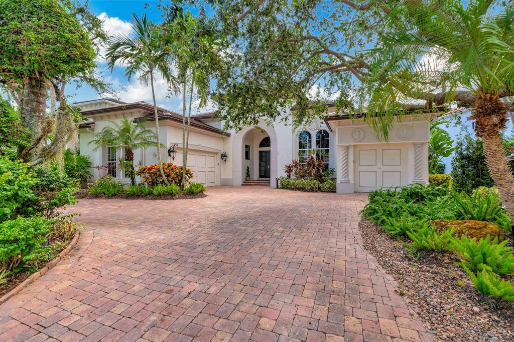 Photo of 436 Savoie Drive, Palm Beach Gardens, FL 33410 (MLS # R11026235)