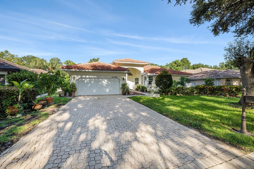 Photo of 4166 NW 66th Terrace, Coral Springs, FL 33067 (MLS # B26080834)