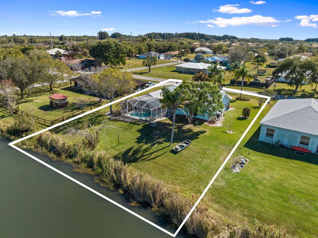 Photo of 212 Deerwood Lane, Fort Pierce, FL 34947 (MLS # R11161732)