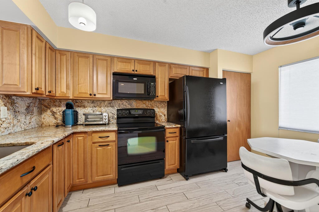 Photo of 6193 Pointe Regal Circle #106, Delray Beach, FL 33484 (MLS # R11110876)