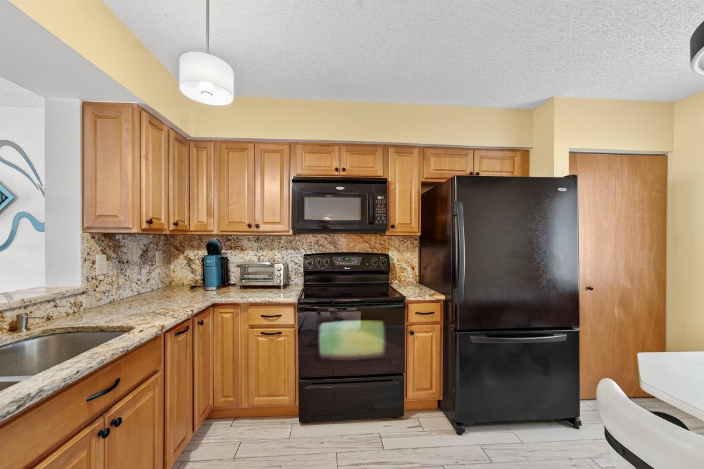 Photo of 6193 Pointe Regal Circle #106, Delray Beach, FL 33484 (MLS # R11110876)