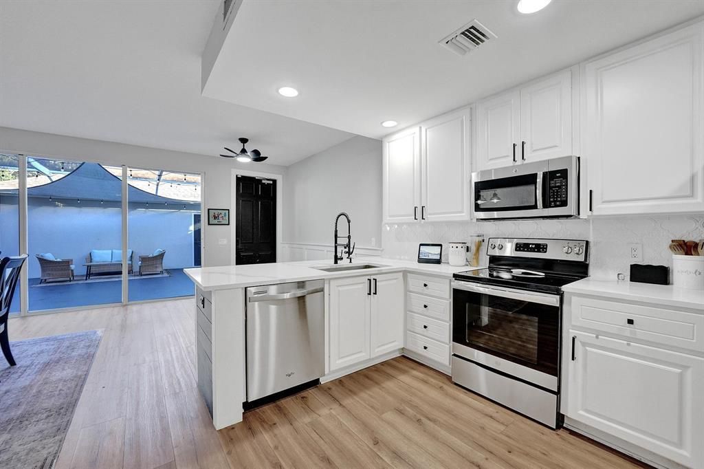 Photo of 129 Farmingdale Drive, Jupiter, FL 33458 (MLS # R10859711)