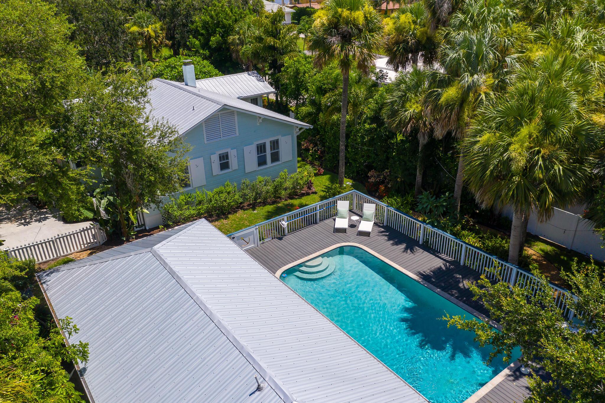 Ideal location! A private tree-lined culdesac in the heart of Downtown Stuart- walking distance to the water, parks, restaurants and shops. A 3/2 main house is supplemented by a 1/1 guest house that doubles as a pool house, perfect for visitors and entertaining. Large private pool with pool deck and fenced in yard. Built in 1938 with original cypress and pine, this home offers a true old Florida experience with plenty of history, comfort and charm, all within the highly coveted Downtown Stuart.