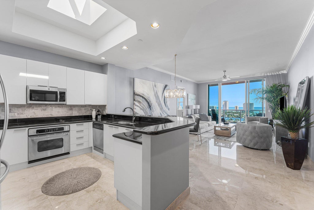 Photo of 2640 Lake Shore Drive #2215, Riviera Beach, FL 33404 (MLS # B26041879)