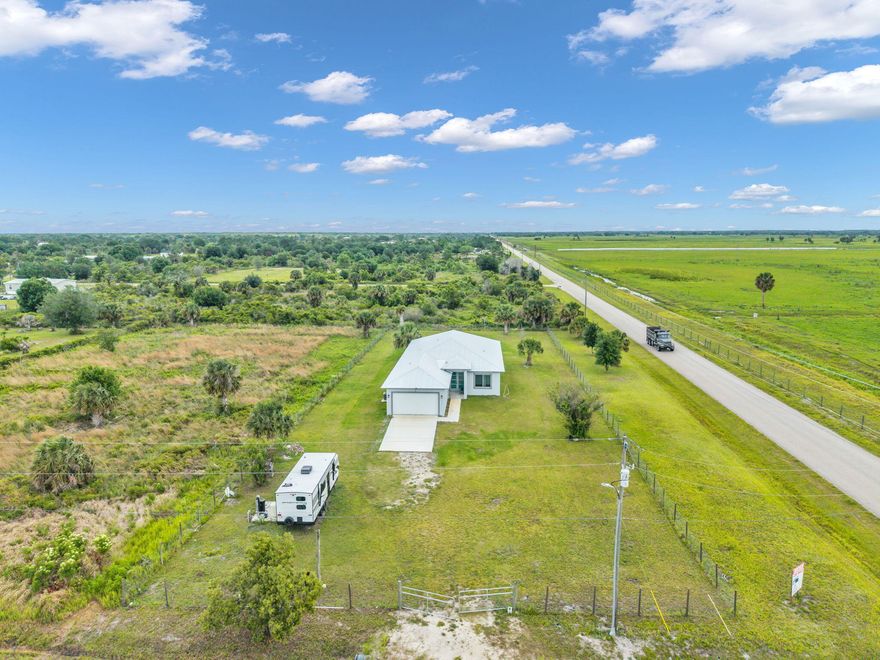Brand-new 2025 CBS construction on 1.25 acres! This 4BR/2.5BA home offers 2,113 sq ft under air and 2,923 TLA with a modern split floor plan and upscale finishes throughout. Features include wood-look Laminate flooring, tray ceilings, recessed lighting, and an open-concept living area with oversized sliders leading to the covered patio. The kitchen boasts granite countertops, shaker cabinets, stainless steel appliances, and a large island perfect for entertaining. Spacious primary suite features dual walk-in closets, dual vanities, soaking tub, and tiled walk-in shower. Indoor laundry room, oversized covered patio, and 2-car garage complete this beautifully designed home with room for a pool, workshop, RVs, or boats.