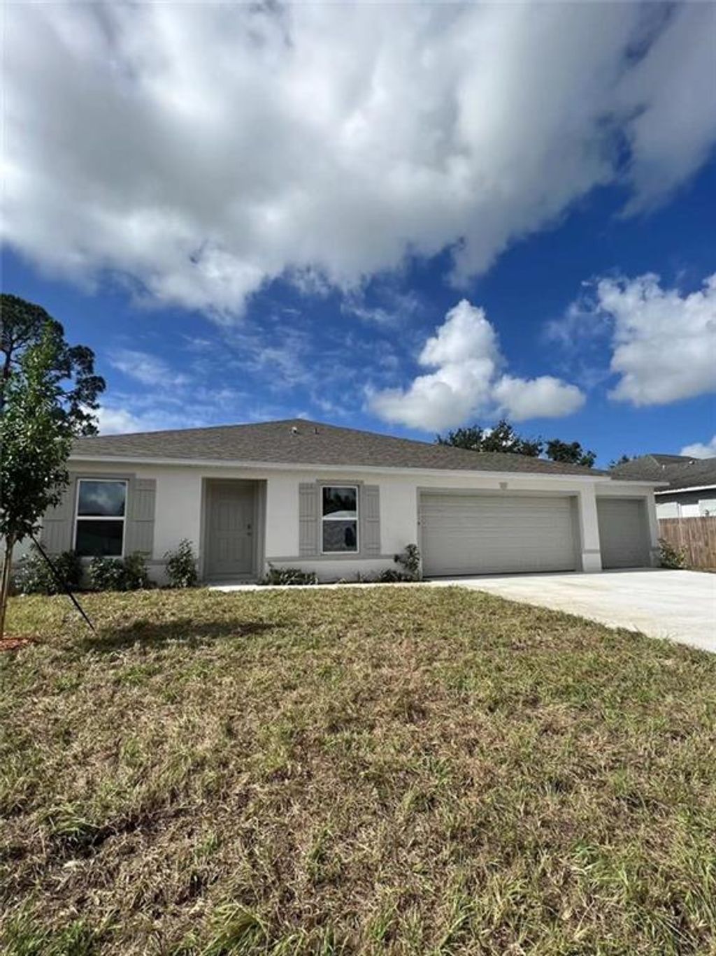 Photo of 1714 SW Haylake Ave Ave, Port Saint Lucie, FL 34953 (MLS # F10342330)