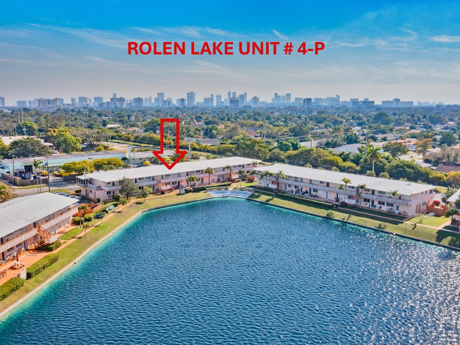 LOOKING FOR A WATERFRONT UNIT? Open the front door of this unit and you will see the " BLUE WATER " from THE LAKE! This fantastic GROUND FLOOR unit is selling FURNISHED TURNKEY! OPEN KITCHEN with new VENEER WOOD POLYESTER cabinets, GRANITE Countertop & newer appliances. New plumbing and lighting fixtures throughout the unit. NEW WATER HEATER (2024). 13" tile ceramic floor. Large pantry inside the unit. Cozy new dining table set (2024). Gorgeous new REMODELED NEW BATH. Two wall a/c (2021). Spacious bedroom well furnished with wall to wall mirror closet doors that led to private terrace with BBQ. Shutters on all openings. Great 55 + community with clubhouse, pool, gym, library, billard, bocce, pétanque, and more. Cash only. Rent right away, seasonal only. Building with large reserve.