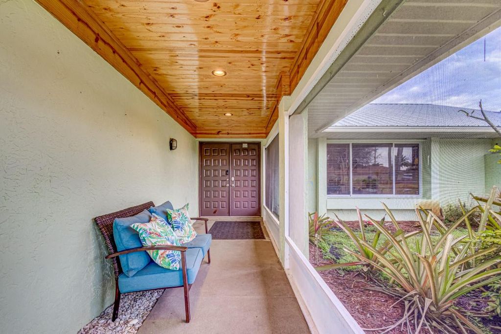 Photo of 1409 SW Aachen Avenue, Port Saint Lucie, FL 34953 (MLS # R10953011)