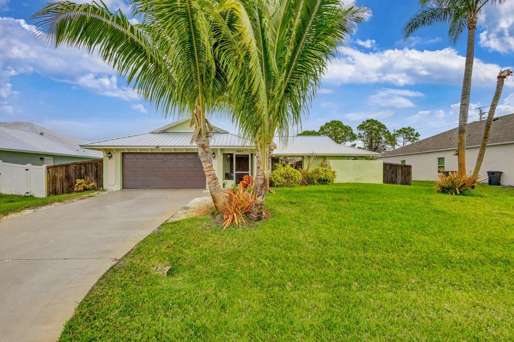 Photo of 1409 SW Aachen Avenue, Port Saint Lucie, FL 34953 (MLS # R10953011)