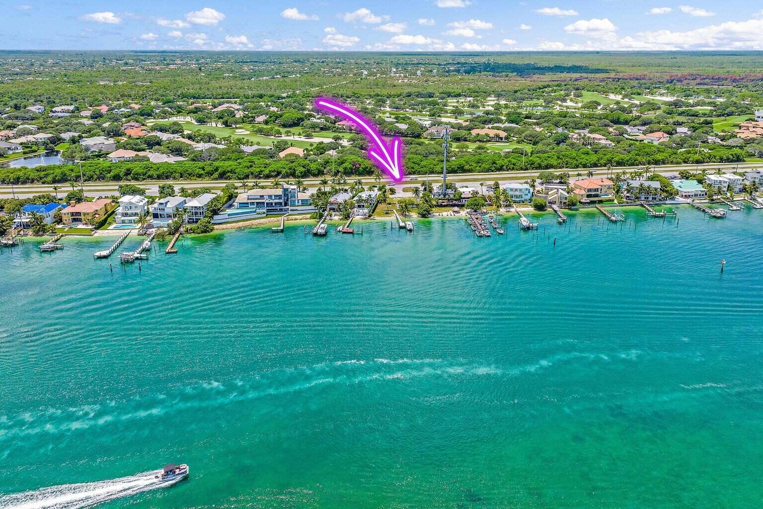 Have you been searching for the perfect waterfront getaway in Florida but nothing has spoken to you yet? THIS IS IT. This is your opportunity to own a waterfront LOT with a dock situated on the coveted Bahama BLUE water and located directly across from the majestic Jupiter Island! Build your own BRAND NEW home!Enjoy sweeping views of Jupiter Island and ocean breezes from every vantage point on the property. Spend your days lounging by your private dock, take a boat ride to nearby waterfront restaurants, or explore the beautiful beaches of Jupiter, Florida.Homes are permit ready with interior customizations available. Ask the team for more information about renderings from builder, deposit structure and sales contract!