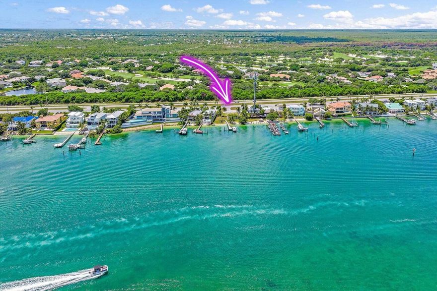 Have you been searching for the perfect waterfront getaway in Florida but nothing has spoken to you yet? THIS IS IT. This is your opportunity to own a waterfront LOT with a dock situated on the coveted Bahama BLUE water and located directly across from the majestic Jupiter Island! Build your own BRAND NEW home!Enjoy sweeping views of Jupiter Island and ocean breezes from every vantage point on the property. Spend your days lounging by your private dock, take a boat ride to nearby waterfront restaurants, or explore the beautiful beaches of Jupiter, Florida.Homes are permit ready with interior customizations available. Ask the team for more information about renderings from builder, deposit structure and sales contract!