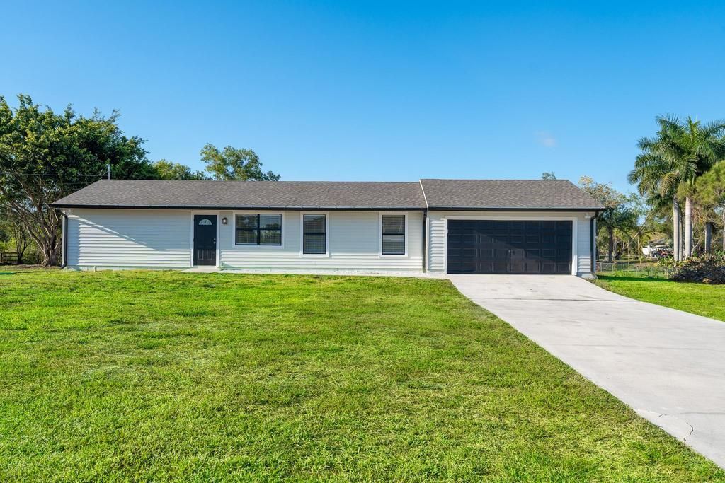 Photo of 16931 Hamlin Boulevard, Loxahatchee, FL 33470 (MLS # R10873697)