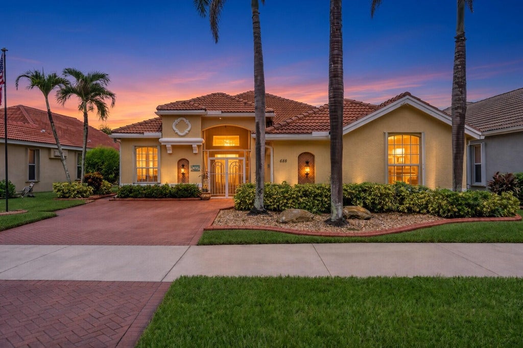 Photo of 688 SW Lake Charles Circle, Port Saint Lucie, FL 34986 (MLS # B26073273)