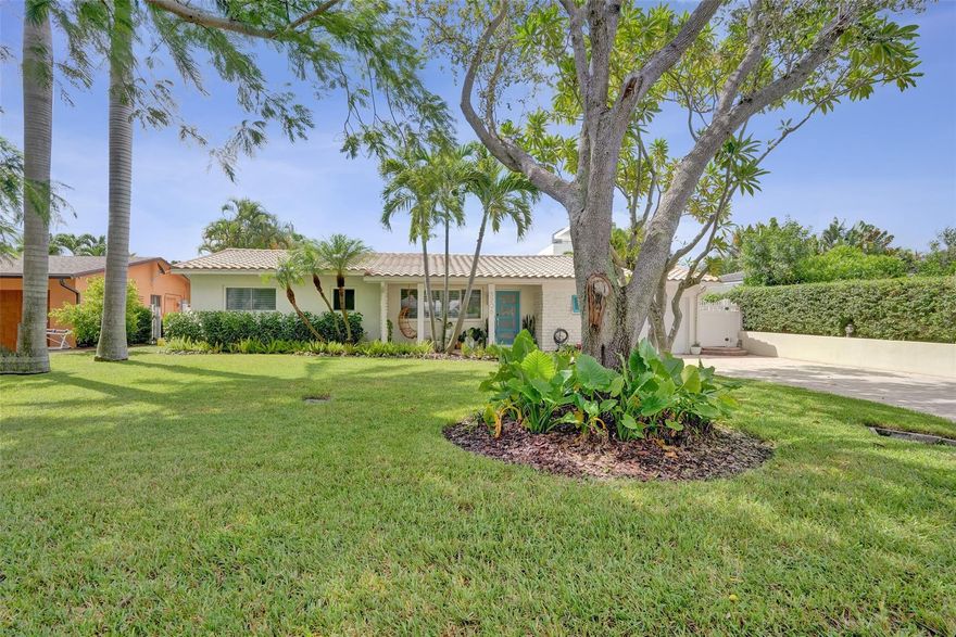 Stunning 4-bed, 3-bath + bonus room home should be in the pages of a design magazine! Tastefully upgraded & meticulously maintained, it offers style, comfort & attn. to detail. Located in highly sought-after Hillsboro Shores—Pompano Beach’s most exclusive neighborhood w/ private beach access—this tropical retreat features kitchen w/ upgraded appl. incl. Bosch gas range & bar overlooking spacious living & dining areas. Primary suite w/ barn doors leads to spa-inspired bath, complete w/ dual-sink vanity, sleek shower, stand alone tub & lg walk-in closet. 2 BRs w/ terrazzo & plantation shutters add timeless charm. Private fenced yard is an entertainer’s dream w/ heated pool & hot tub. Add. upgrades incl. 2 ACs, tankless gas water heater & more. Ready for new owners & can be sold turn key!