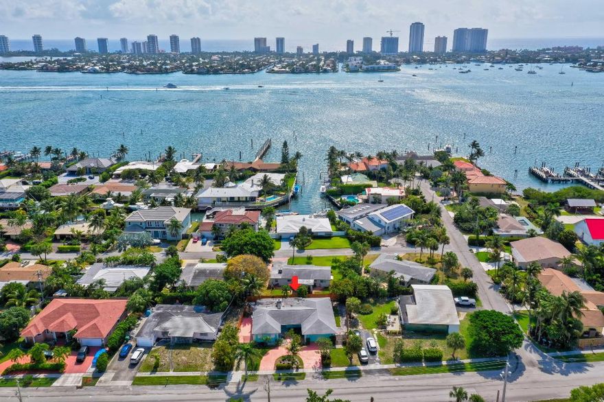 Boat lovers come take a look at this charming home, Park your boat in the 2nd driveway to paved boat storage area. Boat community and you can walk to Lake Park Marina. Close to the beaches, marinas and shopping. 2,294 sq ft 3/2 and a bonus shower in garage. Accordion/Panel shutters throughout, A/C only 5 years old. DON'T MISS THIS GEM! Come view this home today!