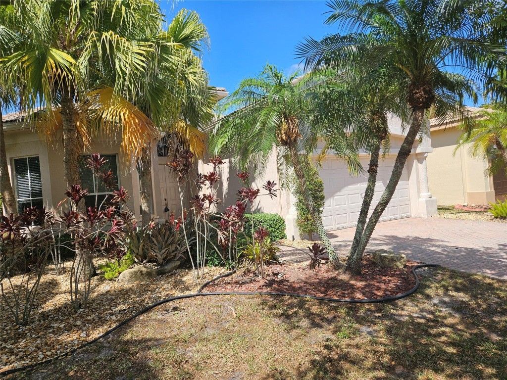 Photo of 11655 NW 71st Place, Parkland, FL 33076 (MLS # F10499522)