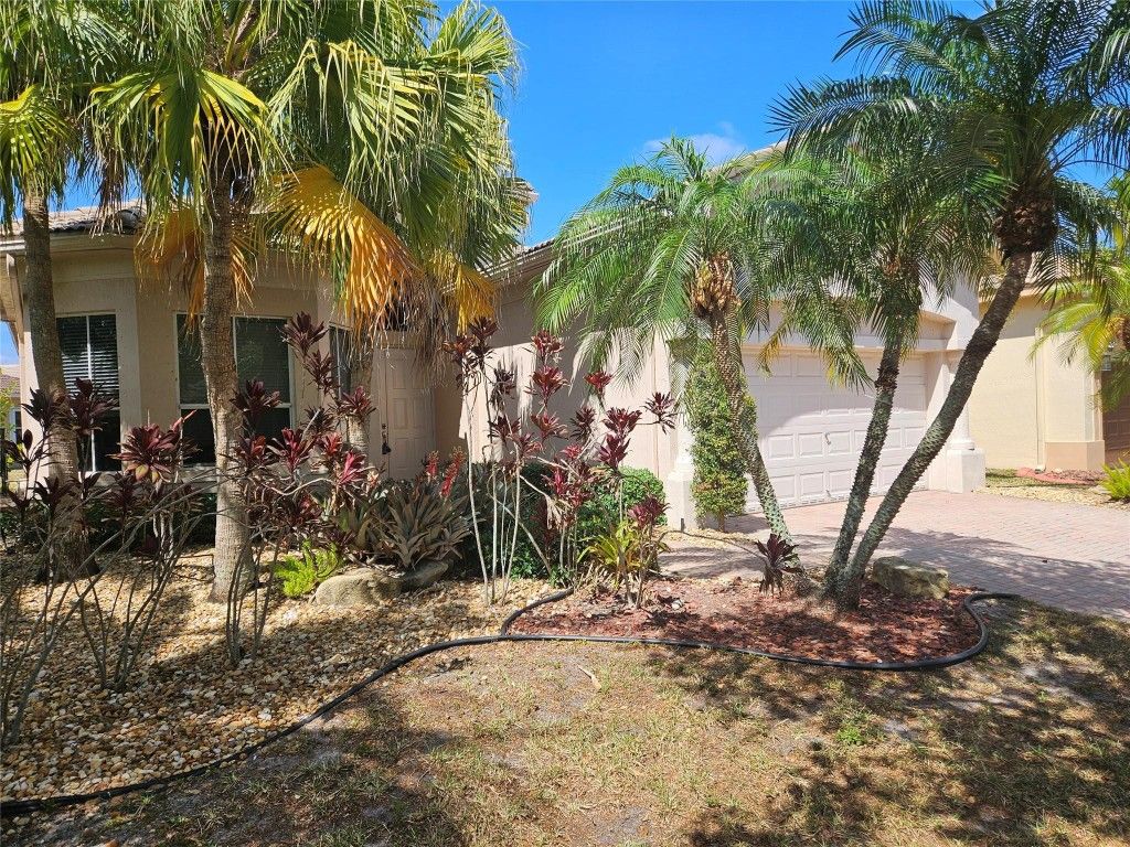 Photo of 11655 NW 71st Place, Parkland, FL 33076 (MLS # F10499522)