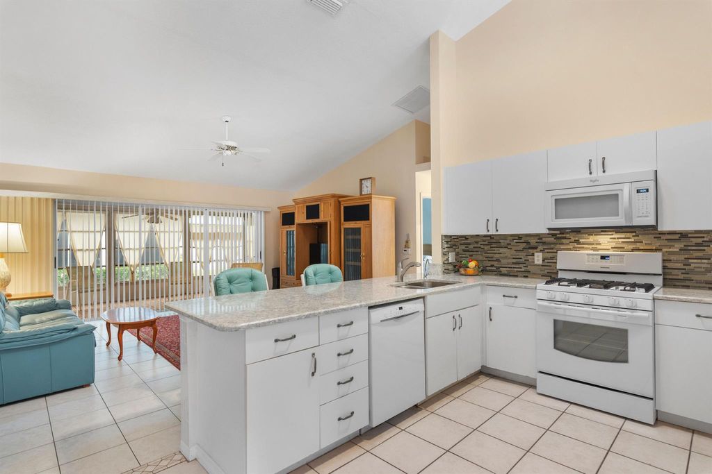 Photo of 430 NW Sherry Lane, Port Saint Lucie, FL 34986 (MLS # R11049673)
