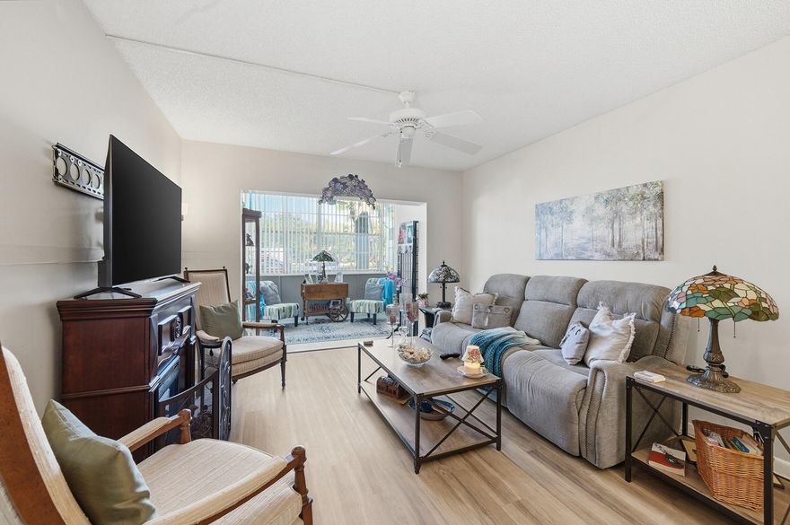 Inviting 1-bedroom, 1.5-bath first-floor condo in the desirable Holiday Springs community. This charming unit features a spacious layout with plenty of natural light and newer flooring throughout. The kitchen has been refreshed with the removal of the original drop ceiling, creating a more open feel. The large primary bedroom includes ample closet space and an en-suite bath, while the additional half bath adds convenience for guests. Enjoy easy ground-floor access and relax in your enclosed patio, perfect for additional living space, a home office, or a cozy sitting area. Holiday Springs offers resort-style amenities including a clubhouse, pool, fitness center, and more. Conveniently located near shopping, dining, and major roadways. Perfect for year-round living or a seasonal retreat. 55+ community. No rentals permitted. 24-hour notice required for all showings. Please use ShowingTime.  Please submit all offers with proof of funds or pre-approval letter. Association requirements include a minimum 20% down payment, 650+ credit score, and six months of association fees to be held in escrow for 18 months. Buyer to verify all association requirements, restrictions, and approval process.