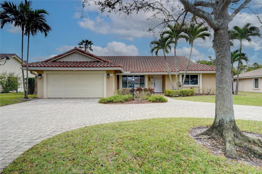 Welcome to your dream home! No HOA! This single-family home features 3 bedrooms, 2 bathrooms, A grand circular paver driveway, Upgraded kitchen with SS appliances, real wood cabinets, granite counters, engineered hardwood floors in living, dining room & Primary, tile through out the main house, New carpet in two of the bedrooms. Dive into luxury with your pool surrounded by your updated paver patio. Stay prepared with a House generator (Propane tank installed) and benefit from solar panels for an electric bill less than $30 per month. ALL IMPACT WINDOWS,WH & AC 2019 & Roof 2018. Separate laundry room adds convenience. Screened patio for outdoor living. Fenced backyard offers privacy. Experience the perfect blend of comfort, style, and functionality. Your dream home awaits! Hurry!