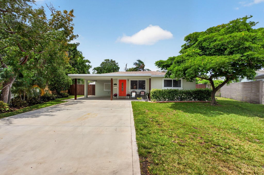Photo of 451 NE 48th Court, Oakland Park, FL 33334 (MLS # B26027401)