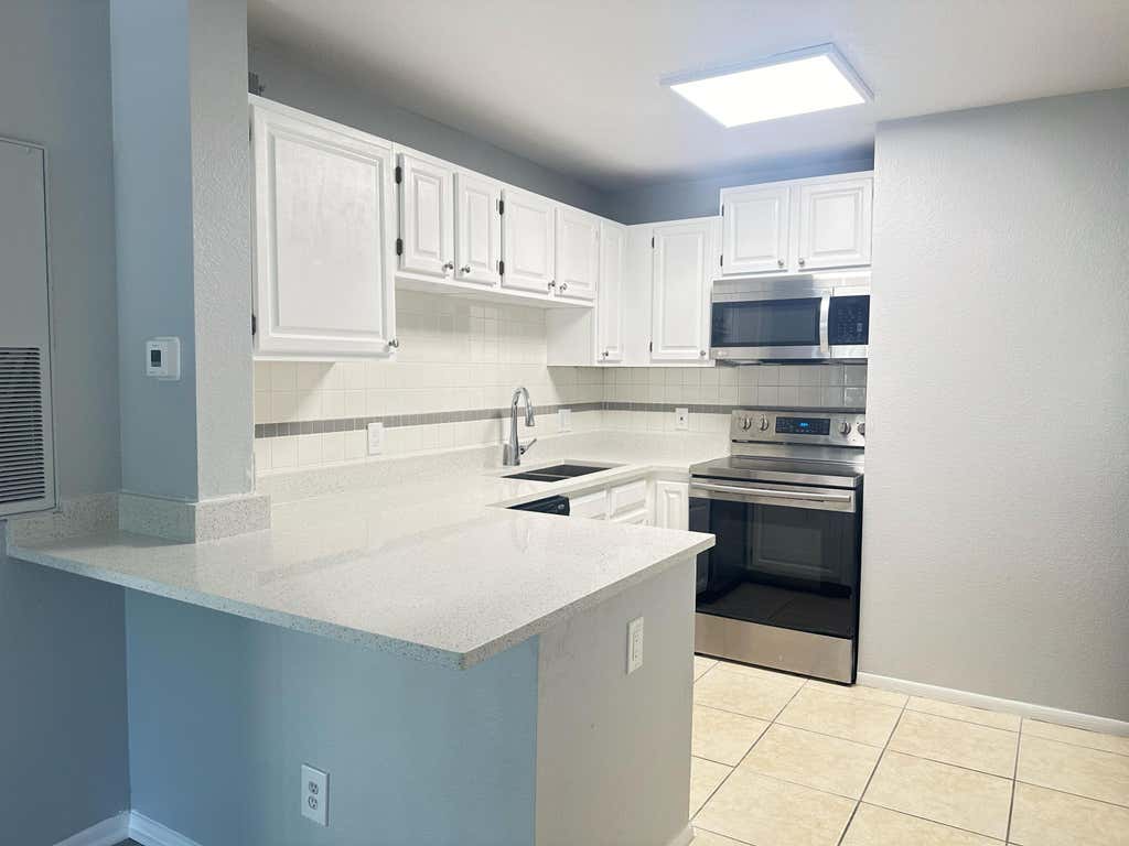 Photo of 1725 Palm Cove Boulevard #204, Delray Beach, FL 33445 (MLS # R10942561)