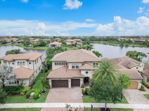 Photo of 11525 NW 81st Place, Parkland, FL 33076 (MLS # B26046529)