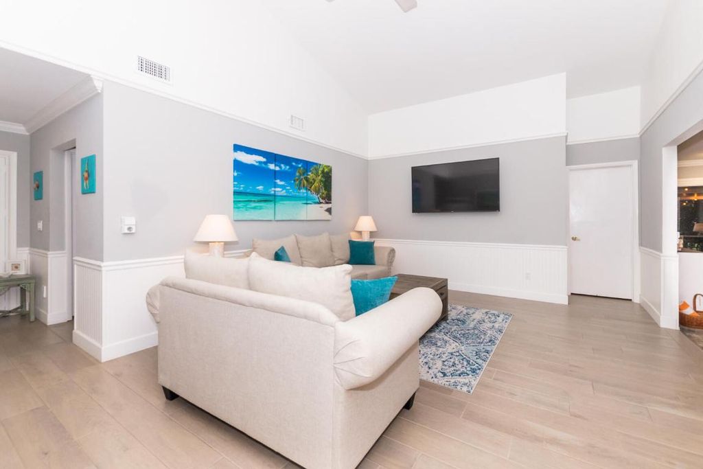 Photo of 4041 NE Breakwater Drive, Jensen Beach, FL 34957 (MLS # R11120482)