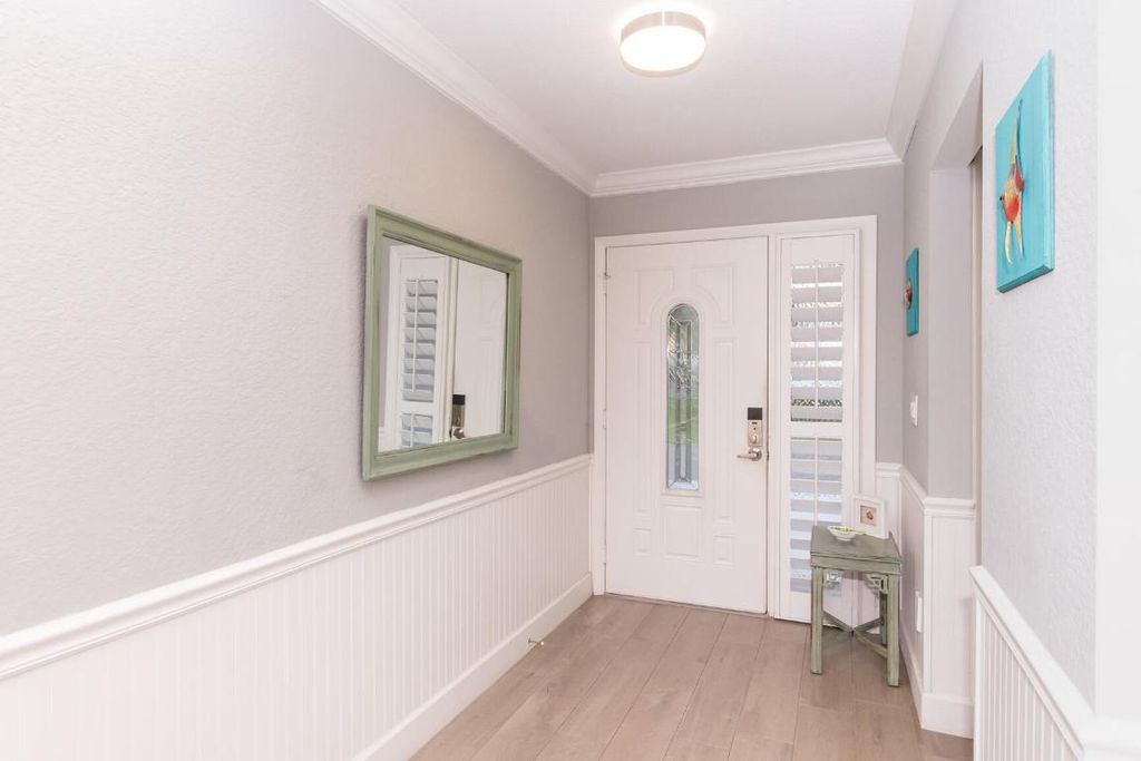 Photo of 4041 NE Breakwater Drive, Jensen Beach, FL 34957 (MLS # R11120482)