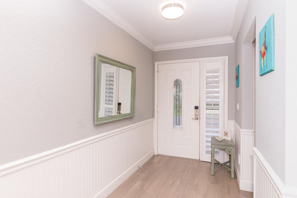 Photo of 4041 NE Breakwater Drive, Jensen Beach, FL 34957 (MLS # R11120482)