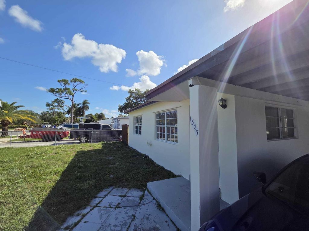 Photo of 1327 SW 22nd Avenue, Fort Lauderdale, FL 33312 (MLS # B26010702)