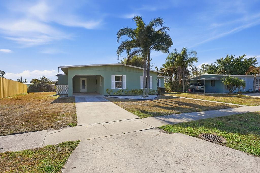 Photo of 2817 SE Pocatello Road, Port Saint Lucie, FL 34952 (MLS # R11166109)