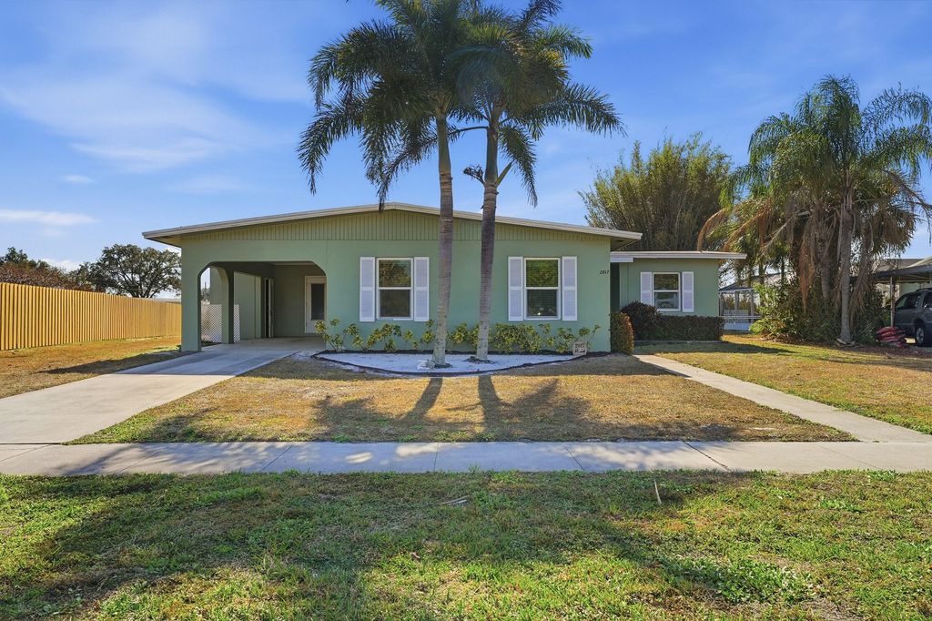Photo of 2817 SE Pocatello Road, Port Saint Lucie, FL 34952 (MLS # R11166109)