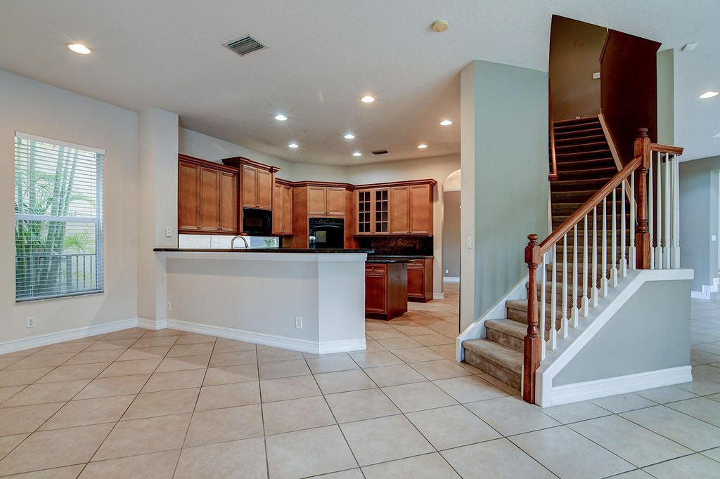 Photo of 670 Edgebrook Lane, Royal Palm Beach, FL 33411 (MLS # B26032726)