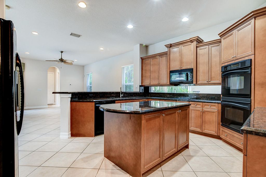 Photo of 670 Edgebrook Lane, Royal Palm Beach, FL 33411 (MLS # B26032726)